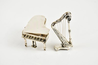 Lot 2498 - A sterling silver harp and piano, both stamped...