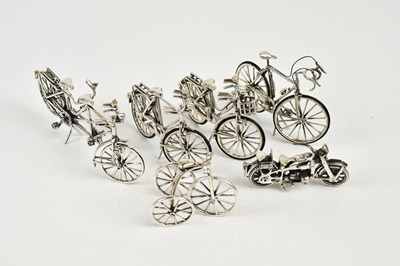 Lot 2447 - A collection of sterling silver miniature...