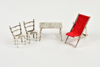 Lot 2495 - MEDUSA-ORO; a sterling silver miniature table...
