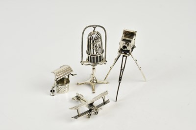 Lot 2458 - A small group of miniature sterling silver...