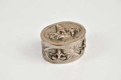 Lot 2232 - An Eastern white metal pill box, decorated...