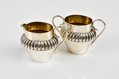 Lot 2056 - A Victorian hallmarked silver cream jug and...