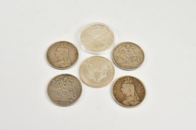 Lot 2667 - A group of four Victorian crowns, dated 1887,...