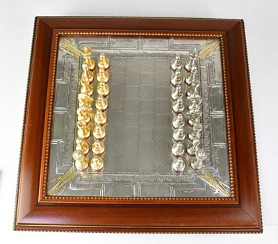 Lot 906 - A sterling silver chessboard within wooden...
