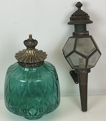 Lot 435 - A metal and glass wall lamp in the style of...