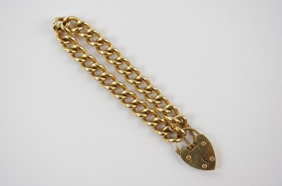 Lot 403 - A 9ct yellow gold curb link bracelet, approx...