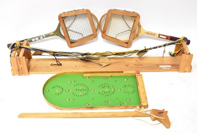 Lot 560 - A vintage Bagatelle board, length 62cm, two...