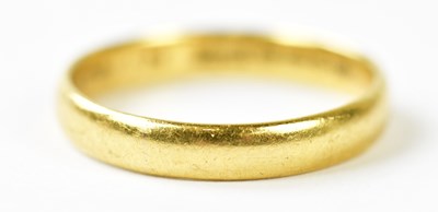 Lot 1137 - A 22ct yellow gold wedding band, size Q,...