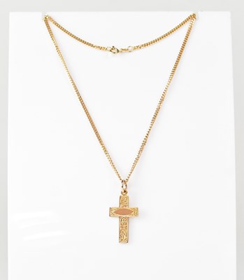 Lot 1199 - A 9ct gold cross, height 3cm, on a 9ct gold...