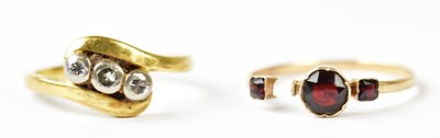 Lot 1143 - A Victorian yellow metal diamond set three...