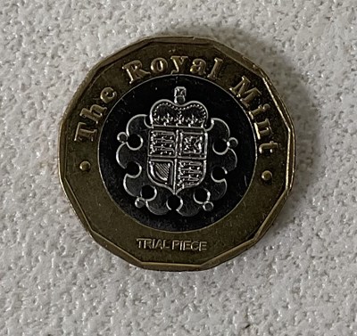 Lot 391 - ROYAL MINT; a 2015 £1 Trial Piece