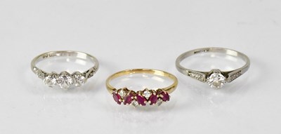 Lot 1124 - A 9ct gold ring set with small diamonds and...