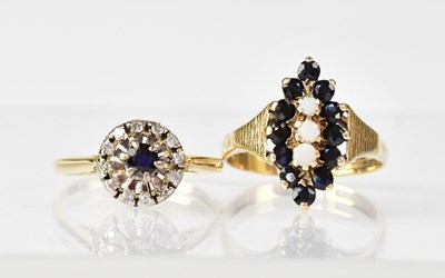 Lot 1112 - A 9ct gold ring set with three small graduated...