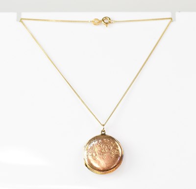 Lot 1188 - A 9ct gold locket, diameter 2.25cm, approx. 5g,...