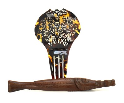 Lot 602 - A 20th century pierced tortoiseshell...