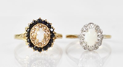 Lot 1115 - Two 9ct gold rings, one set with small oval...