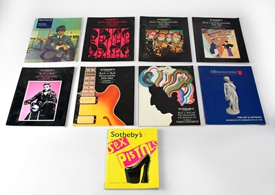 Lot 409 - ROCK & POP; a collection of Sotheby's and...