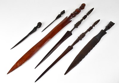 Lot 603 - A collection of African carved items to...
