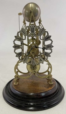 Lot 416 - A 19th century brass skeleton clock with Roman...