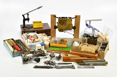 Lot 706 - A collection of pocket watch parts, tools,...