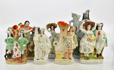 Lot 2842 - A collection of seven Staffordshire figures...