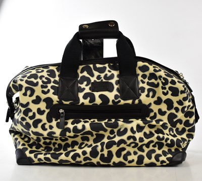 Lot 792 - LULU GUINNESS; a black and cream coated canvas...