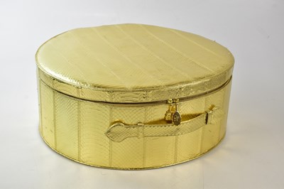 Lot 811 - LULU GUINNESS; a large gold embossed snakeskin...