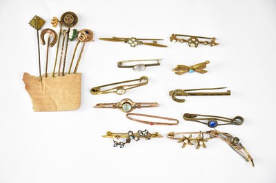 Lot 1277 - Twelve gold-coloured bar brooches of various...
