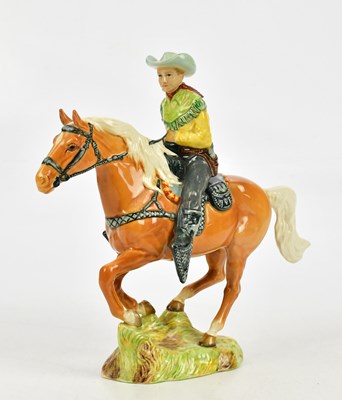 Lot 2788 - BESWICK; a model of a Canadian mounted cowboy,...