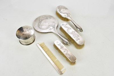 Lot 2405 - TUCK CHANG; a Chinese silver five piece...