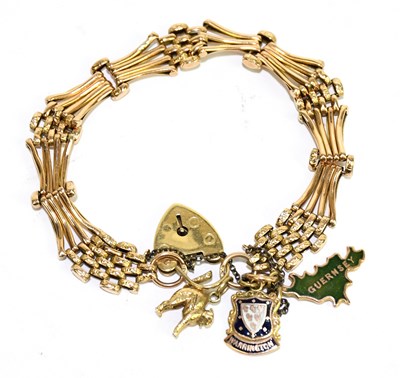 Lot 1271 - A 9ct yellow gold gate link bracelet with...