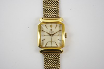 Lot 550 - OMEGA; a gentleman's vintage 18ct gold watch...
