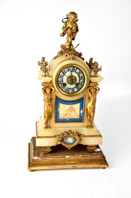 Lot 112 - An early 20th century alabaster and ormolu style 'Pappillion' mantel clock