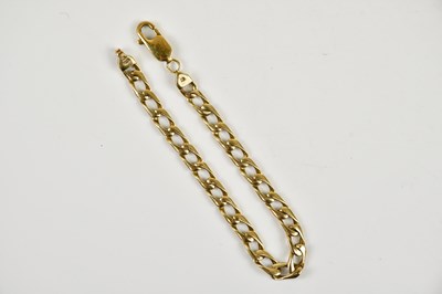 Lot 435 - A yellow metal curb link bracelet, stamped 375,...