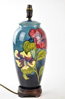 Lot 2766 - WALTER MOORCROFT; a table lamp in the...