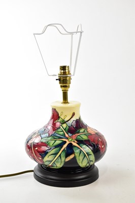 Lot 2767 - MOORCROFT; a modern baluster shaped table lamp,...