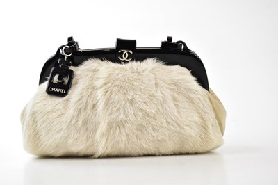 Lot 725 - CHANEL; a limited edition No. 5 Frame handbag...