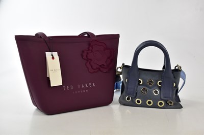 Lot 755 - TED BAKER; an aubergine unused with tags...