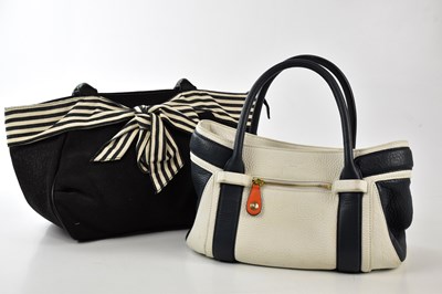 Lot 783 - LK BENNETT; a navy blue and white pebbled...
