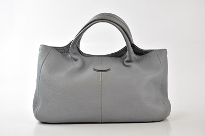 Lot 784 - TOD'S; a light blue pebbled leather handbag,...