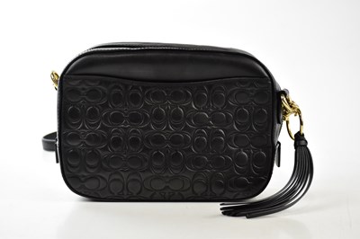 Lot 771 - COACH; a black nappa leather quilted camera...