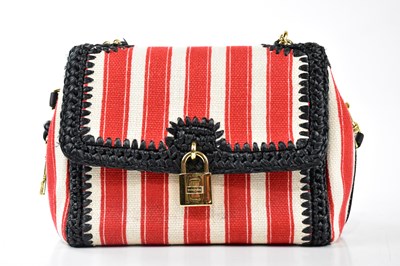 Lot 730 - DOLCE & GABBANA; a red and white striped...