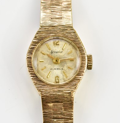 Lot 570 - ACCURIST; a 9ct yellow gold lady's watch with...