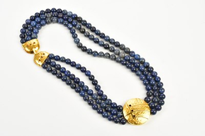 Lot 277 - GUNTHOR; a silver gilt and dumortierite three...