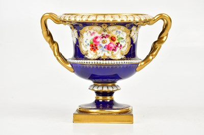 Lot 2910 - E PHILLIPS FOR ROYAL WORCESTER; a twin handled...