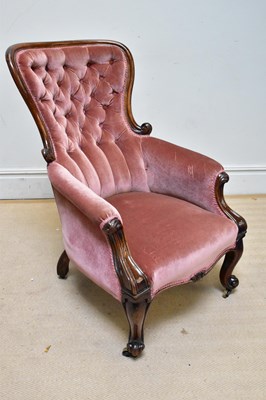 Lot 1065 - A Victorian mahogany spoon back armchair...