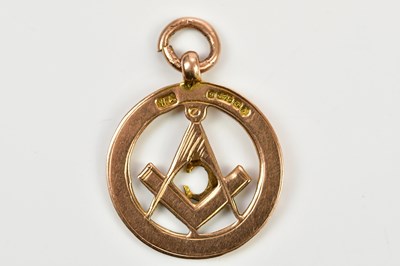 Lot 17 - A Masonic 9ct gold pierced circular pendant,...