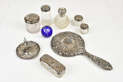 Lot 2427 - A sterling silver backed hand mirror with...
