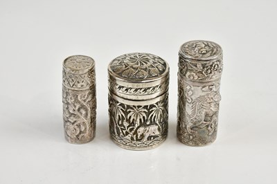 Lot 2455 - An Indian white metal cylindrical box and...