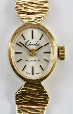 Lot 583 - CHARLES; a 9ct gold lady's watch with bracelet...